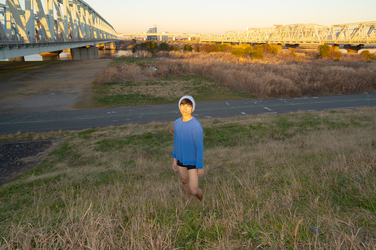 header image, naoto posing